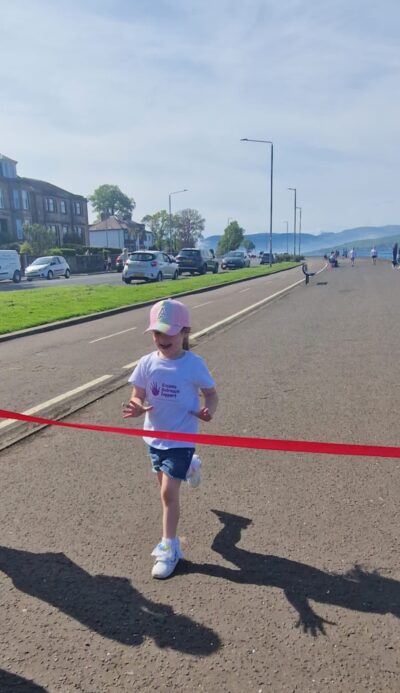 Girl running in EOS t-shirt