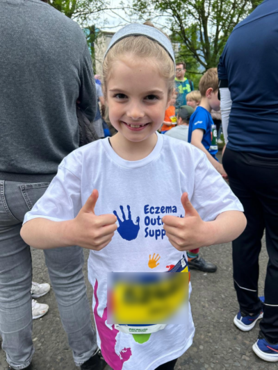 Girl at marathon in EOS t-shirt