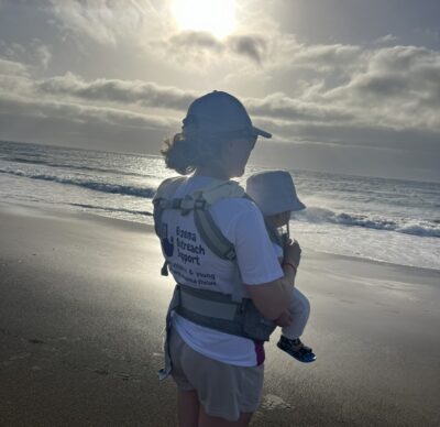 714 mum baby sling on beach EOS t shirt